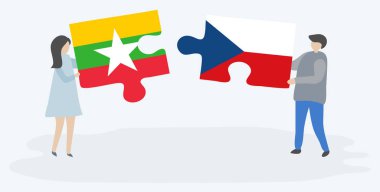 Çift Birmanya ve Çek bayrakları ile iki bulmaca parçaları tutan. Myanmar ve Çek Cumhuriyeti ulusal sembolleri birlikte.
