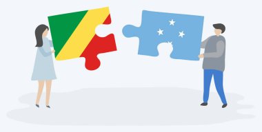 Kongo ve Mikronezya bayrakları ile iki bulmaca parçaları tutan çift. Kongo Cumhuriyeti ve Mikronezya ulusal sembolleri birlikte.