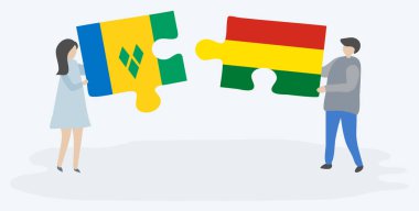 Vincentve Bolivya bayrakları ile iki bulmaca parçaları tutan çift. Saint Vincent ve Grenadinler ve Bolivya ulusal sembolleri birlikte.