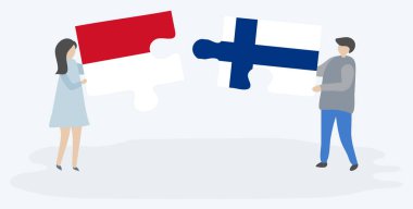 Monegasque ve Fin bayrakları ile iki bulmaca parçaları tutan çift. Monako ve Finlandiya ulusal sembolleri birlikte.