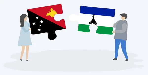 一对夫妇拿着两块拼图 上面挂着巴布亚和巴索托的旗帜 巴布亚新几内亚和莱索托国家符号在一起 — 图库矢量图片
