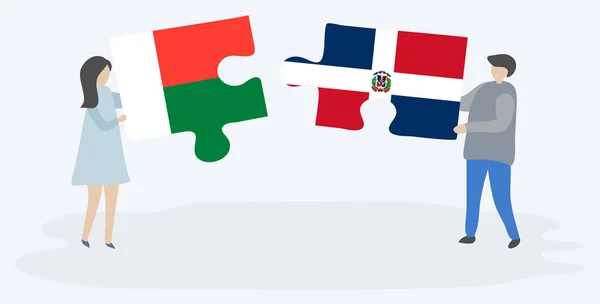 Par Som Innehar Två Pusselbitar Med Madagassiska Och Dominikanska Flaggor — Stock vektor