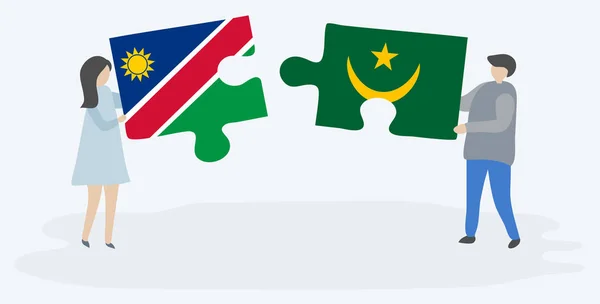 Casal Segurando Duas Peças Quebra Cabeças Com Bandeiras Namíbia Mauritânia —  Vetores de Stock