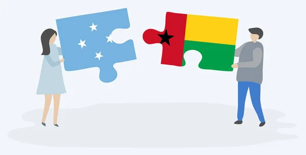 Dvojice Která Drží Dvě Skládanky Vlaječi Bissau Guinejská Vlajka Národní — Stockový vektor