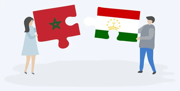 Casal Segurando Duas Peças Quebra Cabeças Com Bandeiras Marroquinas Tajiquistanesas — Vetor de Stock