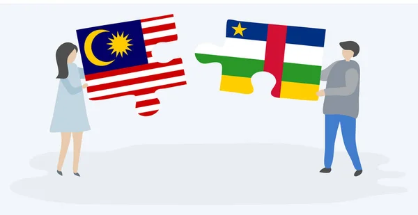 一对夫妇拿着两块拼图 上面挂着马来西亚和中非国旗 马来西亚和中非共和国国家符号在一起 — 图库矢量图片