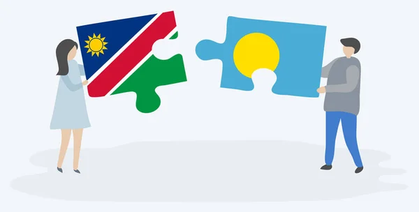 Pareja Sosteniendo Dos Piezas Rompecabezas Con Banderas Namibia Palaos Namibia — Vector de stock