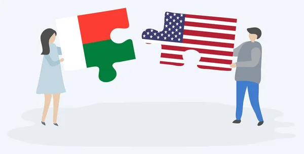 Couple Tenant Deux Pièces Puzzles Avec Des Drapeaux Malgaches Américains — Image vectorielle