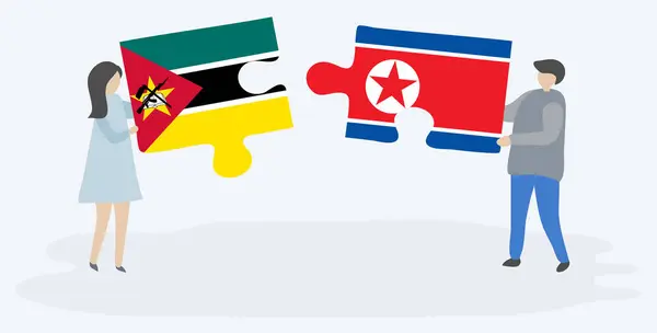 Paar Mit Zwei Puzzleteilen Mit Mosambikanischen Und Nordkoreanischen Flaggen Mosambik — Stockvektor