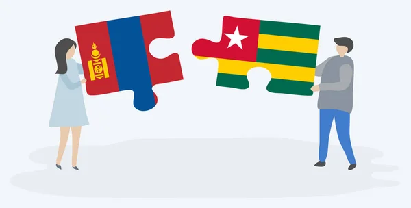 Dvojice Drží Dvě Skládanky Vlajkami Mongolských Togolese Mongolsko Togo Národní — Stockový vektor