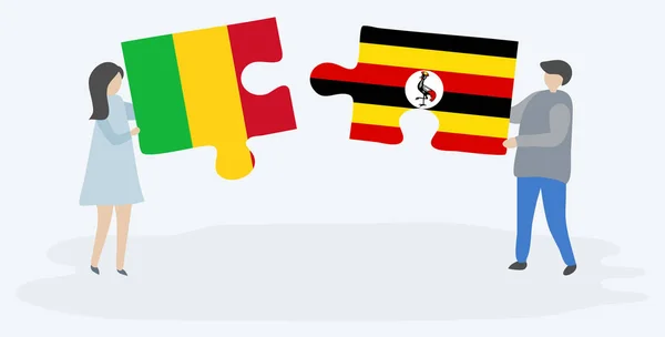 Pareja Sosteniendo Dos Piezas Rompecabezas Con Banderas Malí Uganda Malí — Vector de stock