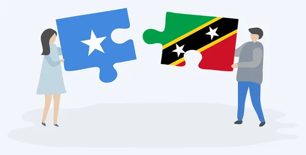 Paar Houden Twee Puzzels Stukken Met Somalische Kittitian Vlaggen Somalië — Stockvector