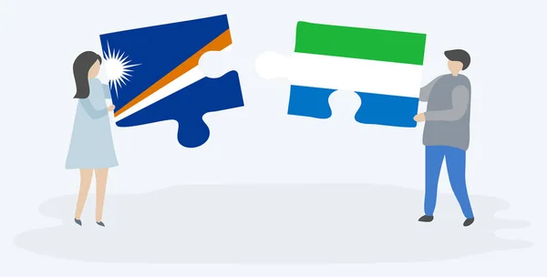 Paar Houden Twee Puzzels Stukken Met Marshallese Sierra Leonean Vlaggen — Stockvector