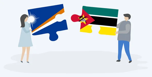 Пара Держащая Две Головоломки Маршальскими Мозамбикскими Флагами Маршалловы Острова Мозамбик — стоковый вектор