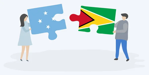 Paar Houden Twee Puzzels Stukken Met Micronesian Guyanese Vlaggen Micronesia — Stockvector
