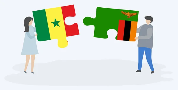 Senegal Zambiya Bayrakları Ile Iki Bulmaca Parçaları Tutan Çift Senegal — Stok Vektör