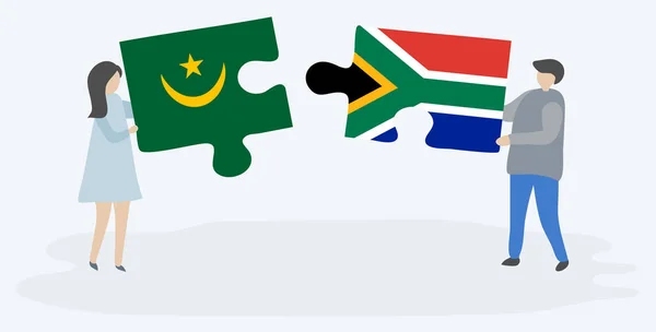 Pareja Sosteniendo Dos Piezas Rompecabezas Con Banderas Mauritanas Sudafricanas Mauritania — Vector de stock