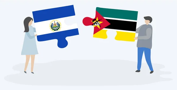 Couple Tenant Deux Pièces Puzzles Avec Des Drapeaux Salvadoriens Mozambicains — Image vectorielle