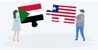 Sudan ve Liberya bayraklarıyla iki bulmaca tutan çift. Sudan ve Liberya ulusal sembolleri birlikte.