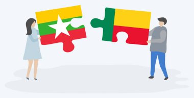 Çift Birmanya ve Beninese bayrakları ile iki bulmaca parçaları tutan. Myanmar ve Benin ulusal sembolleri birlikte.