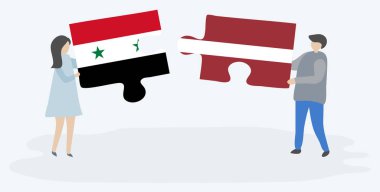 Suriye ve Letonya bayrakları ile iki bulmaca parçaları tutan çift. Suriye ve Letonya ulusal sembolleri birlikte.