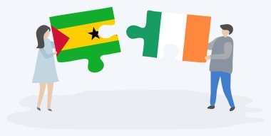 Sao Tomean ve İrlanda bayrakları ile iki bulmaca parçaları tutan çift. Sao Tome ve Principe ve İrlanda ulusal sembolleri birlikte.