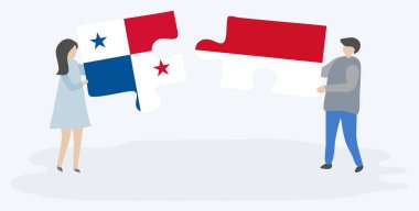 Panama ve Monegasque bayrakları ile iki bulmaca parçaları tutan çift. Panama ve Monako ulusal sembolleri birlikte.