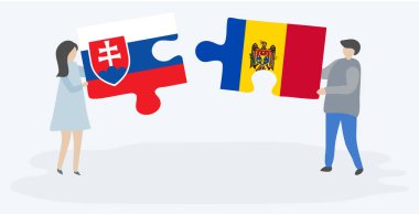 Slovak ve Moldova bayrakları ile iki bulmaca parçaları tutan çift. Slovakya ve Moldova ulusal sembolleri birlikte.
