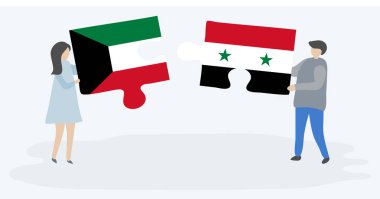 Kuveyt ve Suriye bayrakları ile iki bulmaca parçaları tutan çift. Kuveyt ve Suriye ulusal sembolleri birlikte.