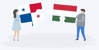 Panama ve Macar bayrakları ile iki bulmaca parçaları tutan çift. Panama ve Macaristan ulusal sembolleri birlikte.