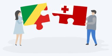 Kongo ve Tongan bayrakları ile iki bulmaca parçaları tutan çift. Kongo Cumhuriyeti ve Tonga ulusal sembolleri birlikte.