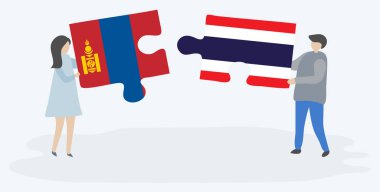 Çift Moğol ve Tay bayrakları ile iki bulmaca parçaları tutan. Moğolistan ve Tayland ulusal sembolleri birlikte.