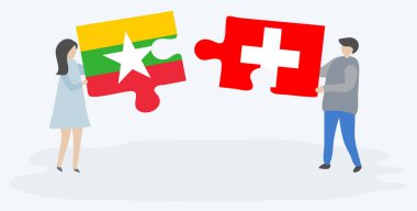 Çift Birmanya ve İsviçre bayrakları ile iki bulmaca parçaları tutan. Myanmar ve İsviçre ulusal sembolleri birlikte.