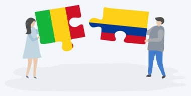 Çift, Mali ve Kolombiya bayraklarıyla iki bulmaca parçası tutuyor. Mali ve Kolombiya ulusal sembolleri birlikte.