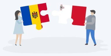 Moldova ve Malta bayraklarıyla iki bulmaca tutan çift. Moldova ve Malta ulusal sembolleri birlikte.
