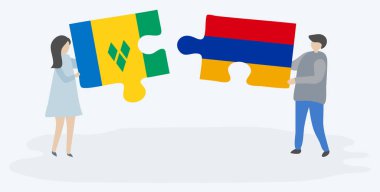 Vincentian ve Ermeni bayrakları yla iki bulmaca tutan çift. Saint Vincent ve Grenadinler ve Ermenistan ulusal sembolleri birlikte.