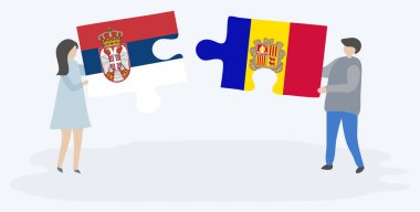 Sırp ve Andorran bayraklarıyla iki bulmaca tutan çift. Sırbistan ve Andorra ulusal sembolleri bir arada.