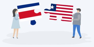 Çift Kosta Rika ve Liberya bayrakları ile iki bulmaca parçaları tutan. Kosta Rika ve Liberya ulusal sembolleri birlikte.