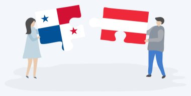 Çift Panama ve Avusturya bayrakları ile iki bulmaca parçaları tutan. Panama ve Avusturya ulusal sembolleri birlikte.