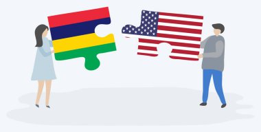 Çift Moritanya ve Amerikan bayrakları ile iki bulmaca parçaları tutan. Mauritius ve Amerika Birleşik Devletleri ulusal sembolleri birlikte.