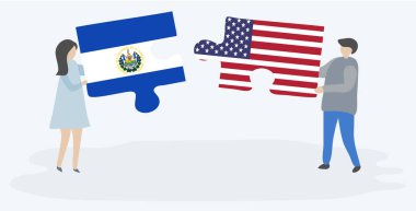 Çift Salvador ve Amerikan bayrakları ile iki bulmaca parçaları tutan. El Salvador ve Amerika Birleşik Devletleri ulusal semboller birlikte.