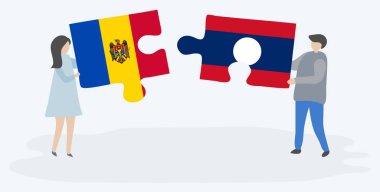 Moldova ve Lao bayrakları ile iki bulmaca parçaları tutan çift. Moldova ve Laos ulusal sembolleri birlikte.