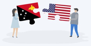 Papuan ve Amerikan bayrakları ile iki bulmaca parçaları tutan çift. Papua Yeni Gine ve Amerika Birleşik Devletleri ulusal sembolleri birlikte.