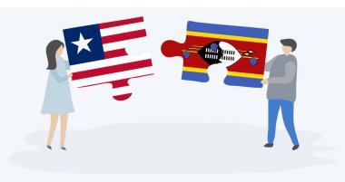 Liberya ve Swazi bayrakları ile iki bulmaca parçaları tutan çift. Liberya ve Svaziland ulusal sembolleri birlikte.