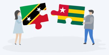 Kittitian ve Togolese bayrakları ile iki bulmaca parçaları tutan çift. Saint Kitts ve Nevis ve Togo ulusal sembolleri birlikte.