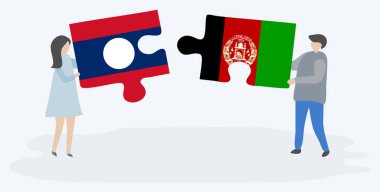 Lao ve Afgan bayrakları ile iki bulmaca parçaları tutan çift. Laos ve Afganistan ulusal sembolleri birlikte.