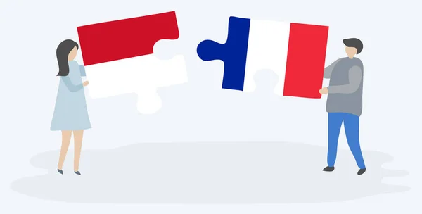 Ζευγάρι Που Κρατά Δύο Κομμάτια Παζλ Μονακό Και Γαλλικές Σημαίες — Διανυσματικό Αρχείο
