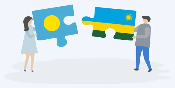 Casal Segurando Duas Peças Quebra Cabeças Com Bandeiras Palauan Ruanda —  Vetores de Stock