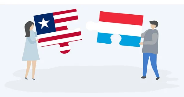 Paar Houden Twee Puzzels Stukken Met Liberiaanse Luxemburgse Vlaggen Liberia — Stockvector