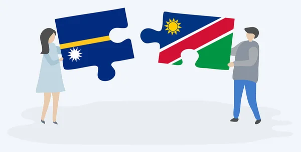 Pareja Sosteniendo Dos Piezas Rompecabezas Con Banderas Nauruan Namibia Nauru — Vector de stock
